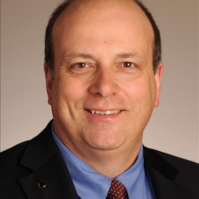 William (Ed) E. Foster, A.A.E., IACE, MBA
